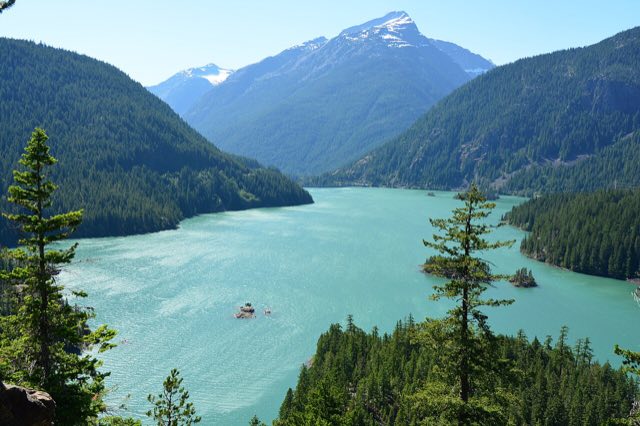 Diablo Lake's turquoise water surrounded by forested peaks, seen from the Diablo Lake Overlook on SR-20