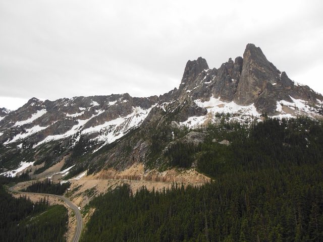The switchbacks of SR-20 climbing toward Washington Pass with Liberty Bell Mountain above