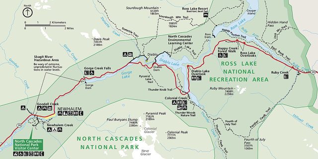 National Park Service map of the North Cascades Highway corridor, showing SR-20 in red from Newhalem past Diablo, Diablo Lake, and Colonial Creek to Ross Lake